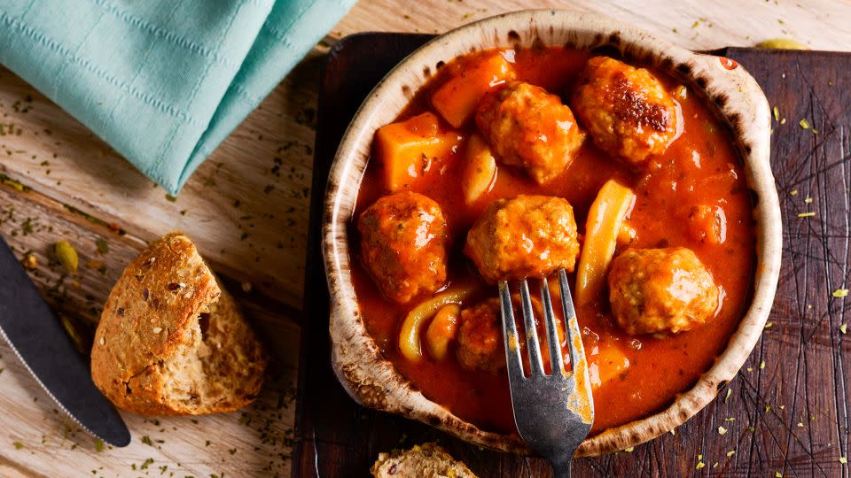 These meatballs in tomato sauce are served all over Spain. - nito100/iStockphoto/Getty Images