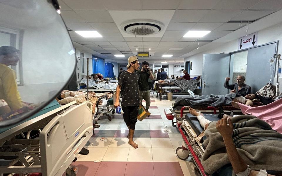 Patients line up in the corridors of the hospital