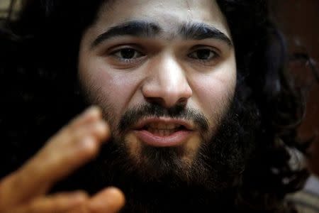 Former bakery worker Walid Ismail speaks during an interview with Reuters in a Kurdish security compound in the city of Erbil, Iraq November 28, 2016. Picture taken November 28, 2016. REUTERS/Azad Lashkari