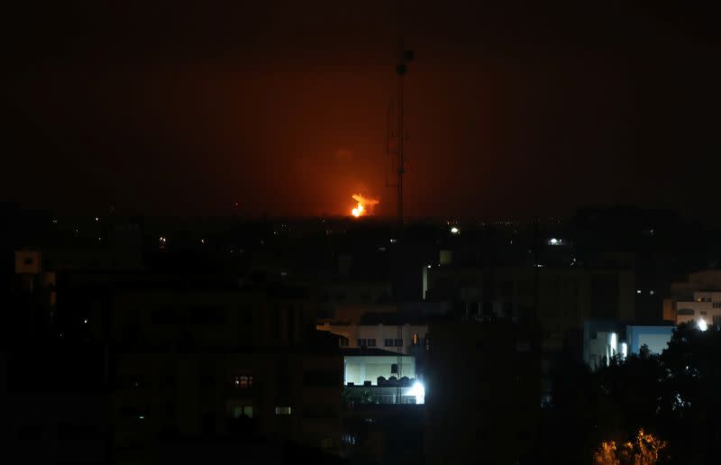 Flame and smoke are seen during an Israeli air strike in Gaza