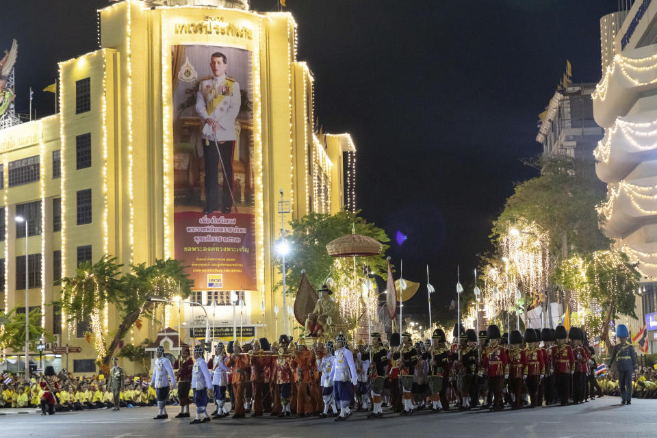 Thailand’s King Maha Vajiralongkorn is carried on a palanquin through the streets for the public to pay homage during the second day of his coronation ceremony in Bangkok, Sunday, May 5, 2019. Vajiralongkorn was officially crowned Saturday amid the splendor of the country's Grand Palace, taking the central role in an elaborate centuries-old royal ceremony that was last held almost seven decades ago. (AP Photo/Wason Wanichorn)