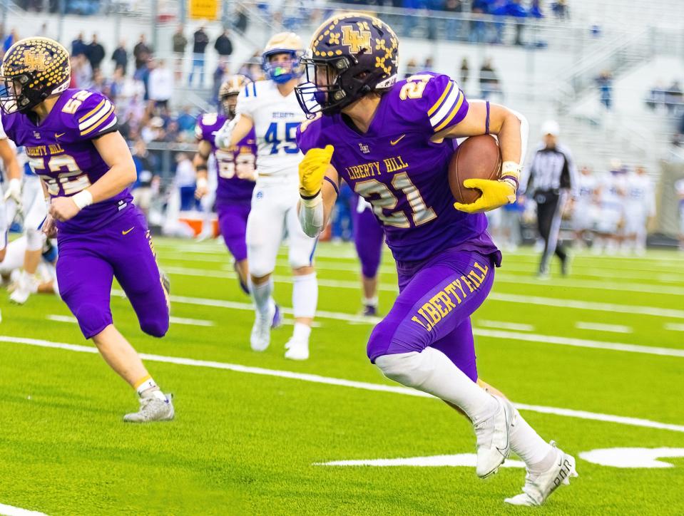 Liberty Hill Panthers running back Noah Long sprints to the end zone against the Alamo Heights Mules during the Class 5A Division II playoffs last season. Long plays a big role in the team's slot-T offense that produced three 1,000-yard rushers last year.