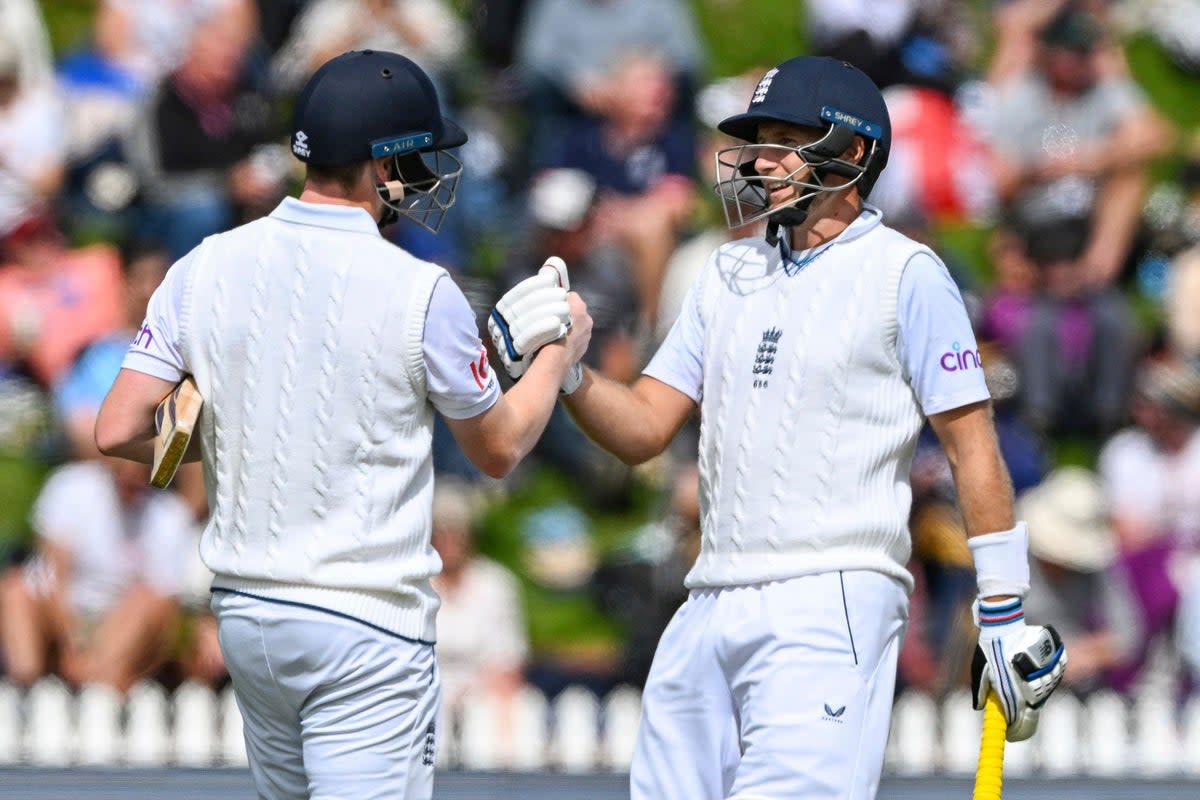 Joe Root, right, and Harry Brook ensured day one ended with England on top (Andrew Cornaga/AP) (AP)