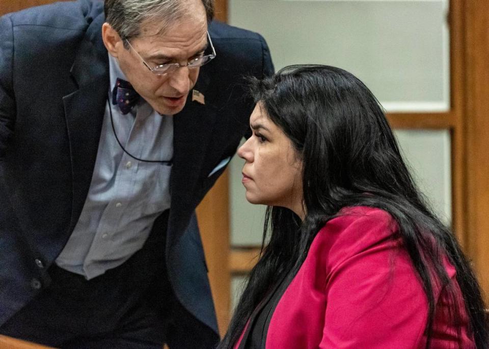 Miami, Florida, January 31, 2024- Former Miami-Dade School Board member Lubby Navarro, right, listens to her attorney, Ben Kuehne, left, in Miami-Dade Criminal Court during a hearing.