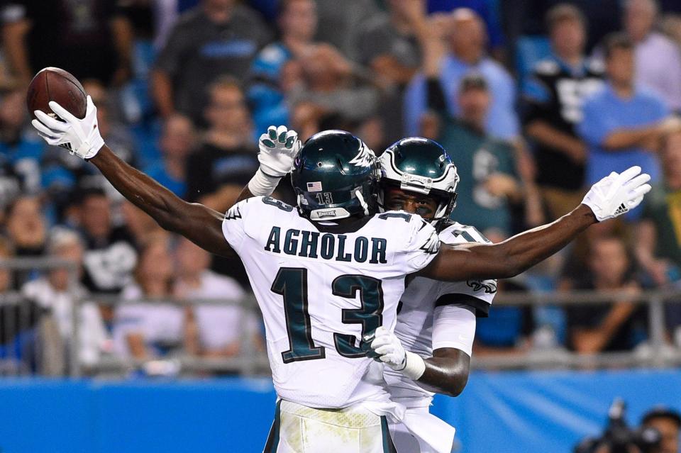 Oct 12, 2017; Charlotte, NC, USA; Philadelphia Eagles wide receiver Nelson Agholor (13) celebrates with wide receiver Alshon Jeffery (17) after scoring a touchdown in the fourth quarter. The Eagles defeated the Panthers 28-23 at Bank of America Stadium. Mandatory Credit: Bob Donnan-USA TODAY Sports