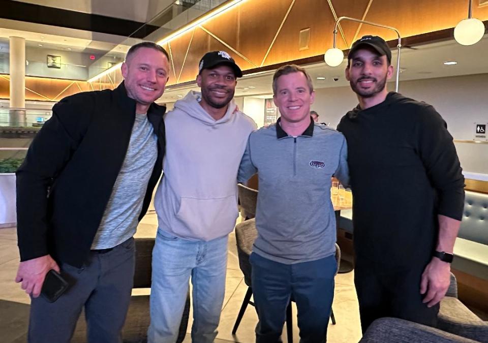 Georgia basketball head coach Mike White, assistant coach Akeem Miskdeen, Florida Atlantic head coach Dusty May and UGA assistant coach Erik Pastrana.