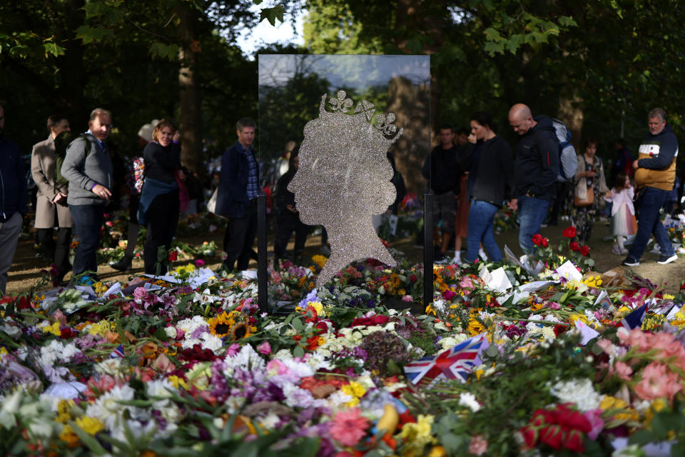 People view floral tributes in Green Park following the death of Britain's Queen Elizabeth II in London