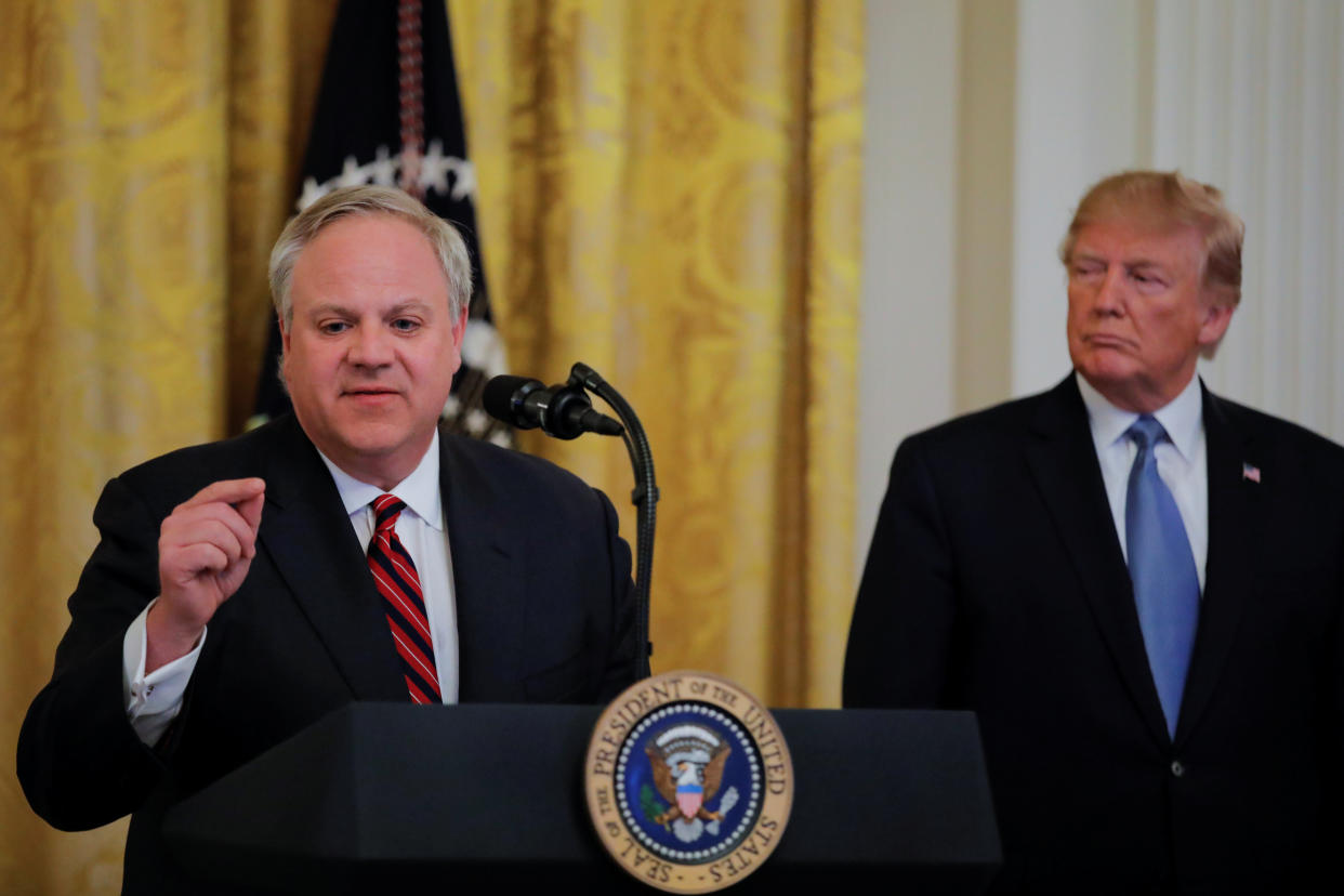 President Donald Trump listens to U.S. Interior Secretary David Bernhardt speak.