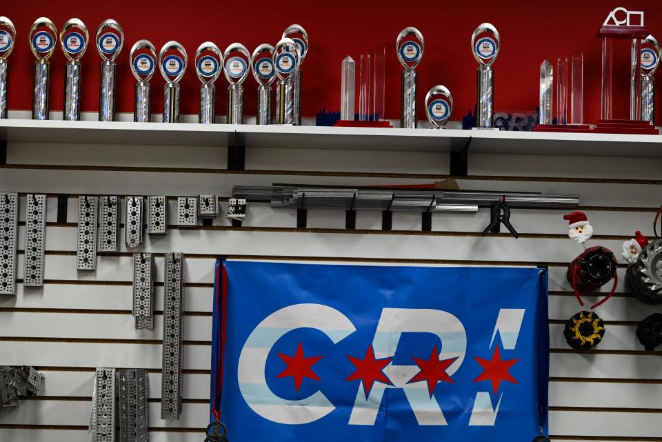 The FireWires' trophies and flag from winning the Indiana State Championship held at the University of Indianapolis on Saturday, March 9, are displayed at the team's Osceola headquarters.