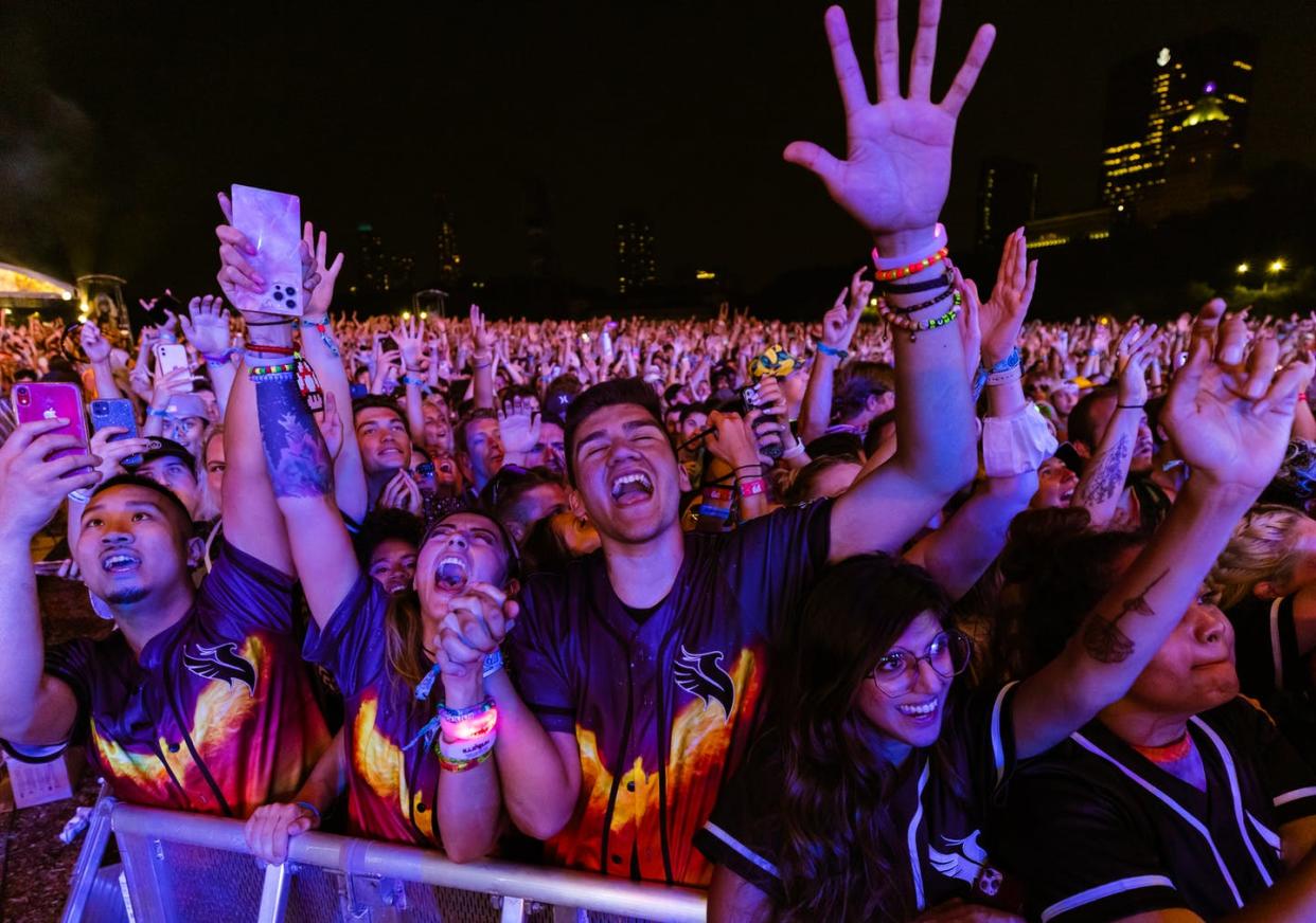 <span class="caption">After taking a pandemic-induced hiatus in 2020, Lollapalooza returned to Chicago in summer 2021.</span> <span class="attribution"><a class="link " href="https://www.gettyimages.com/detail/news-photo/general-atmosphere-on-day-one-of-lollapalooza-at-grant-park-news-photo/1234305934?adppopup=true" rel="nofollow noopener" target="_blank" data-ylk="slk:Michael Hickey/Getty Images;elm:context_link;itc:0;sec:content-canvas">Michael Hickey/Getty Images</a></span>