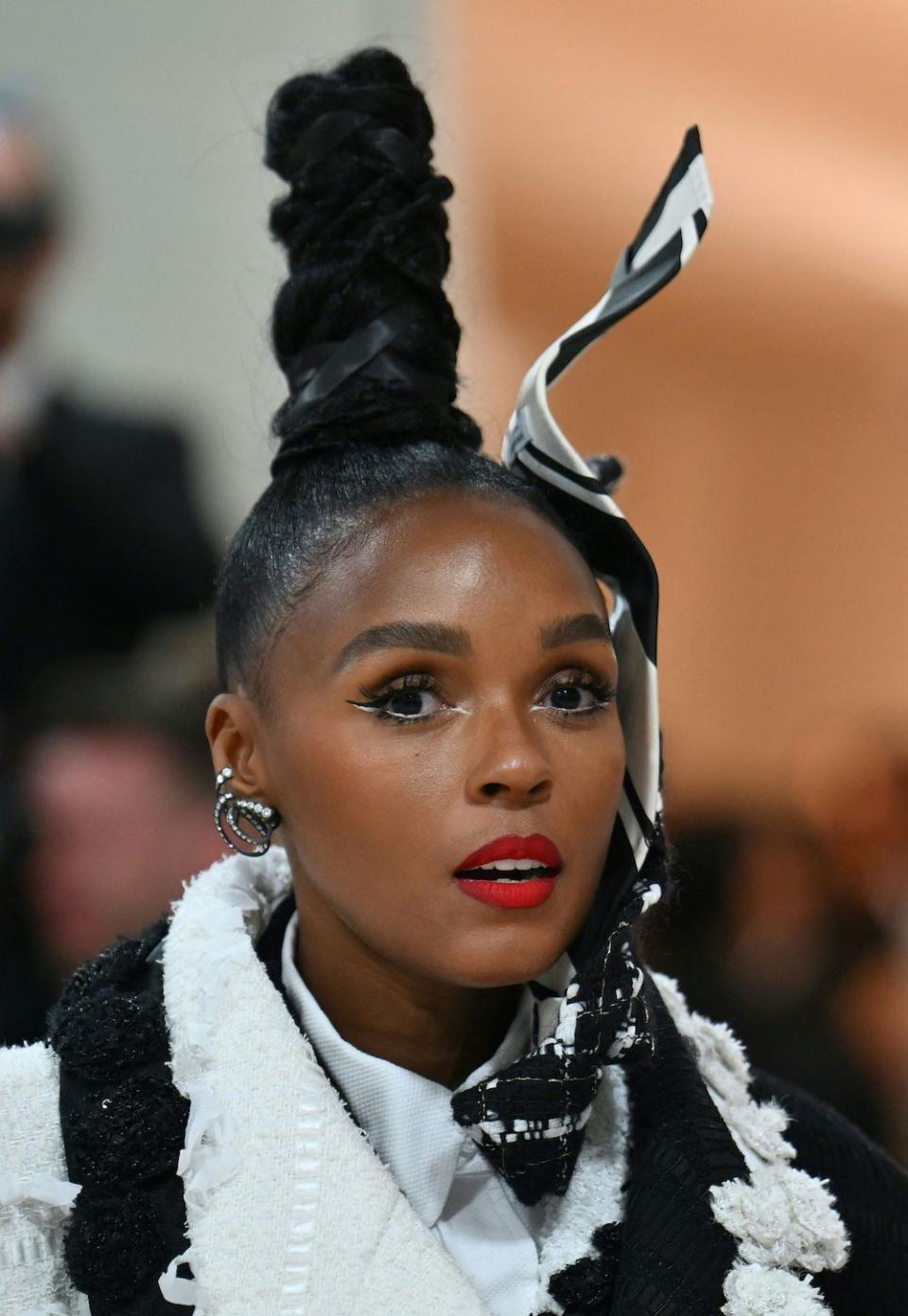 Janelle Monáe's monochromatic dual liner and red lip