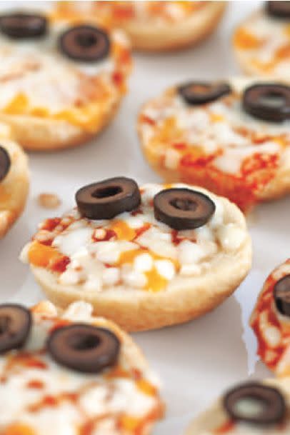 <p>Bagel bites get a spooky seasonal makeover with this recipe. And who says these mini pies can only be enjoyed by the kiddos?</p><p>Get the <strong><a href="https://www.womansday.com/food-recipes/food-drinks/a28834124/edible-monster-pizza-bites-recipe/" rel="nofollow noopener" target="_blank" data-ylk="slk:Edible Monster Pizza Bites recipe;elm:context_link;itc:0;sec:content-canvas" class="link ">Edible Monster Pizza Bites recipe</a></strong>.</p>