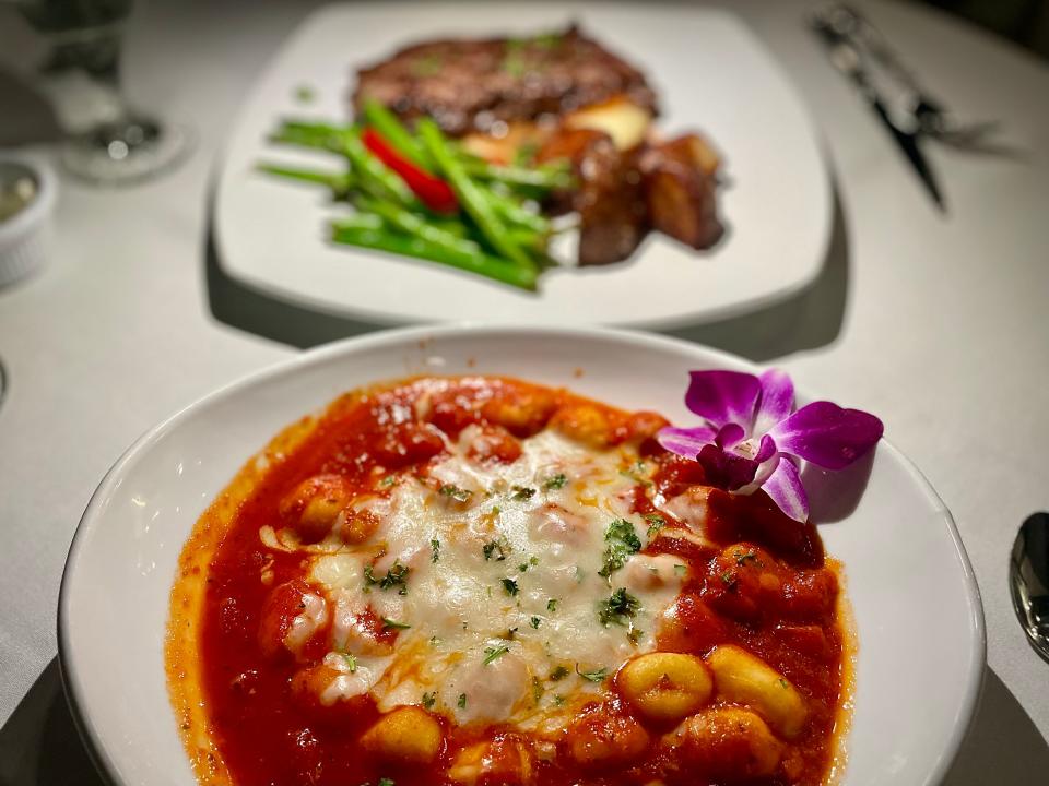 Oven-baked gnocchi and New York strip au poivre from Top of Daytona.