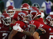 Fresno State tight end Juan Rodriguez, center, celebrates his touchdown against Hawaii with teammate Josh Kelly during the first half of an NCAA college football game in Fresno, Calif., Saturday, Oct. 24, 2020. (AP Photo/Gary Kazanjian)