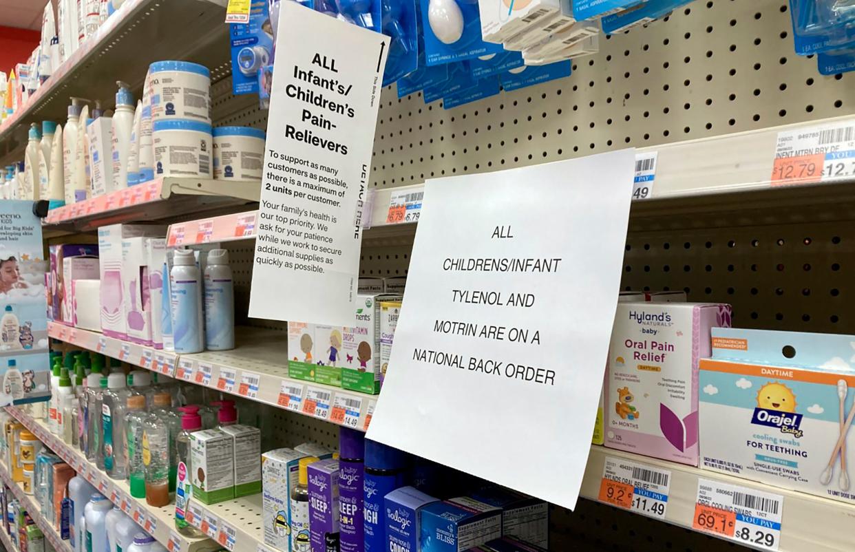 A sign is placed in a New York CVS near the section for children's medicine on Dec. 18. Caring for a sick child has become even more stressful than usual for many parents in recent weeks due to shortages of Children's Tylenol and other medicines.