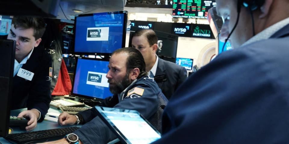 Traders on the floor of the New York Stock Exchange (NYSE)