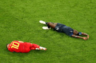 <p>Eden Hazard of Belgium and Blaise Matuidi of France lie on the pitch injured during the 2018 FIFA World Cup Russia Semi Final match between Belgium and France at Saint Petersburg Stadium on July 10, 2018 in Saint Petersburg, Russia. (Photo by Robert Cianflone – FIFA/FIFA via Getty Images) </p>