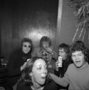 <p>Drinking buddies known as The Hollywood Vampires—John Lennon, Harry Nilsson, Alice Cooper, and Micky Dolenz—celebrate an early Thanksgiving watching singer Anne Murray at the Troubadour on November 21, 1973 in L.A.</p>