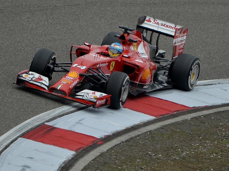 Ferrari driver Fernando Alonso turns a corner during the first practice session for the Formula One Chinese Grand Prix in Shanghai on April 18, 2014