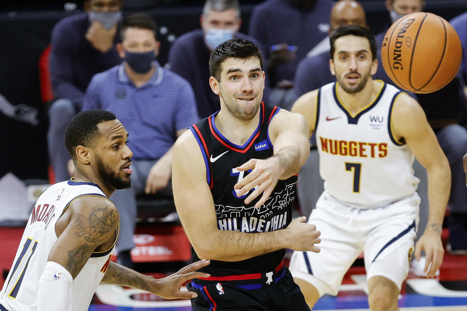 PHILADELPHIA, PENNSYLVANIA - JANUARY 09: Dakota Mathias #33 of the Philadelphia 76ers passes during the third quarter against the Denver Nuggets at Wells Fargo Center on January 09, 2021 in Philadelphia, Pennsylvania. NOTE TO USER: User expressly acknowledges and agrees that, by downloading and or using this photograph, User is consenting to the terms and conditions of the Getty Images License Agreement.