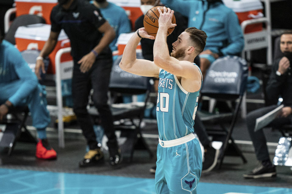 Charlotte Hornets forward Gordon Hayward shoots against the Washington Wizards during the first half of an NBA basketball game in Charlotte, N.C., Sunday, Feb. 7, 2021. (AP Photo/Jacob Kupferman)