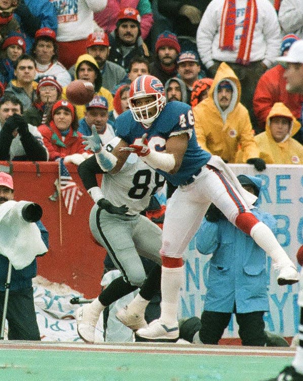 Bills Leonard Smith  steps in front of a pass intended for Raiders tight end Ethan Horton during the Bills 1991 win in the AFC Championship game.