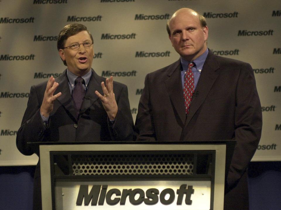 FILE - Microsoft chairman Bill Gates, left, and president and CEO Steve Ballmer speak at a news conference on April 3, 2000 in Redmond, Wash. The U.S. Justice Department's double-barreled antitrust attack on Google's dominant search and Apple's trendsetting iPhone is reviving memories of another epic battle that hobbled Microsoft before it roared back to yet again become the world's most valuable company. (AP Photo/Elaine Thompson, File)