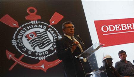 Corinthians soccer club President Mario Gobbi Filho (L) talks to journalists next to Andres Sanchez (R), Corinthians' former president, in the Arena de Sao Paulo Stadium, which will host the opening soccer match of the 2014 World Cup, in Sao Paulo April 15, 2014. REUTERS/Nacho Doce