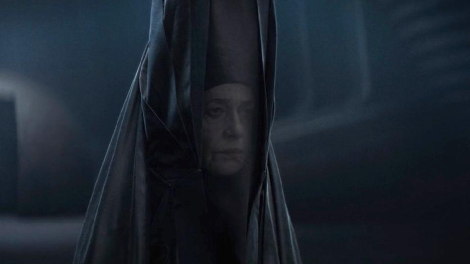 The Reverend Mother of the Bene Gesserit in her high black hat and veil in Dune