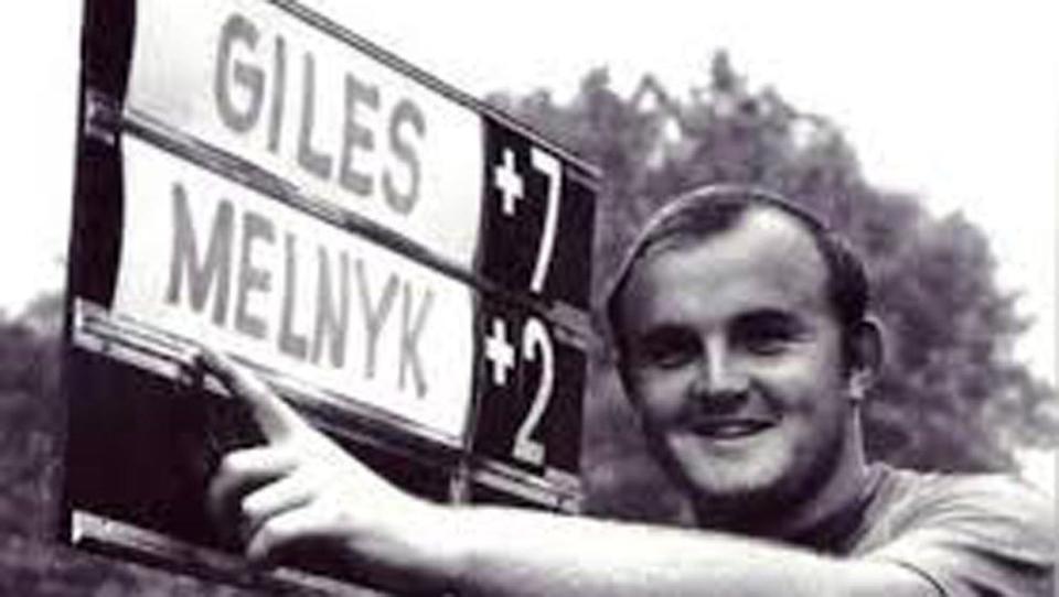 A 22-year-old Steve Melnyk points to the scoring standard that tells the story of the 1969 U.S. Amateur at Oakmont. [Provided by the Florida State Golf Association]