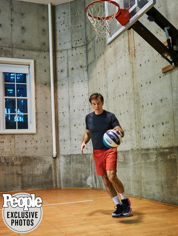 Mehmet (pictured wearing his favorite athletic gear by Rhone) stays active by shooting hoops on his basement basketball court. | Frédéric Lagrange