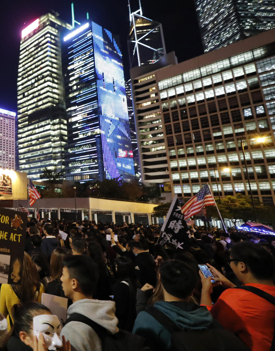 FILE - In this file photo dated Thursday, Nov. 28, 2019, protesters during a demonstration in Hong Kong. The Chinese ambassador to Britain, Liu Xiaoming on Monday July 6, 2020, accused Britain's Prime Minister Boris Johnson of meddling in China's affairs by offering citizenship to 3 million people from Hong Kong following the imposition of a national security law.(AP Photo/Vincent Thian, FILE)