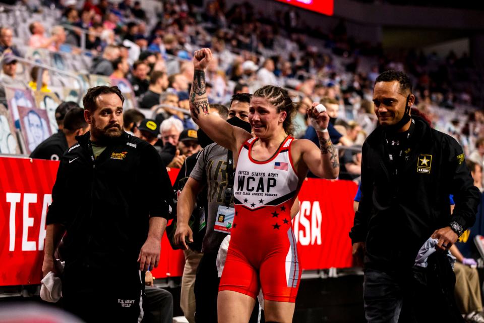 Jenna Burkert reacts after scoring a fall  in the championship tournament finals at 57 kg during the second session of the USA Wrestling Olympic Team Trials, Friday, April 2, 2021, at Dickies Arena in Fort Worth, Texas.