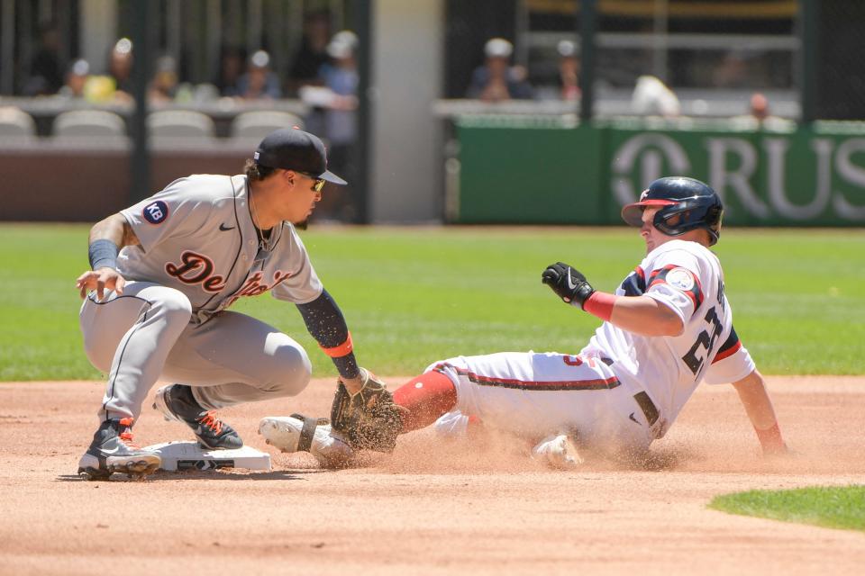 Detroit Tigers shortstop Javier Baez makes the tag on Chicago White Sox Andrew Vaughn during the first inning of a baseball game ,Sunday, July 10, 2022, in Chicago.