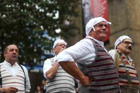 Monty Python fans dressed as the Gumbys gather in an attempt to set the world record for the largest gathering of people dressed as Gumbys as a part of the 50th anniversary of Monty Python's Flying Circus at the Roundhouse in London