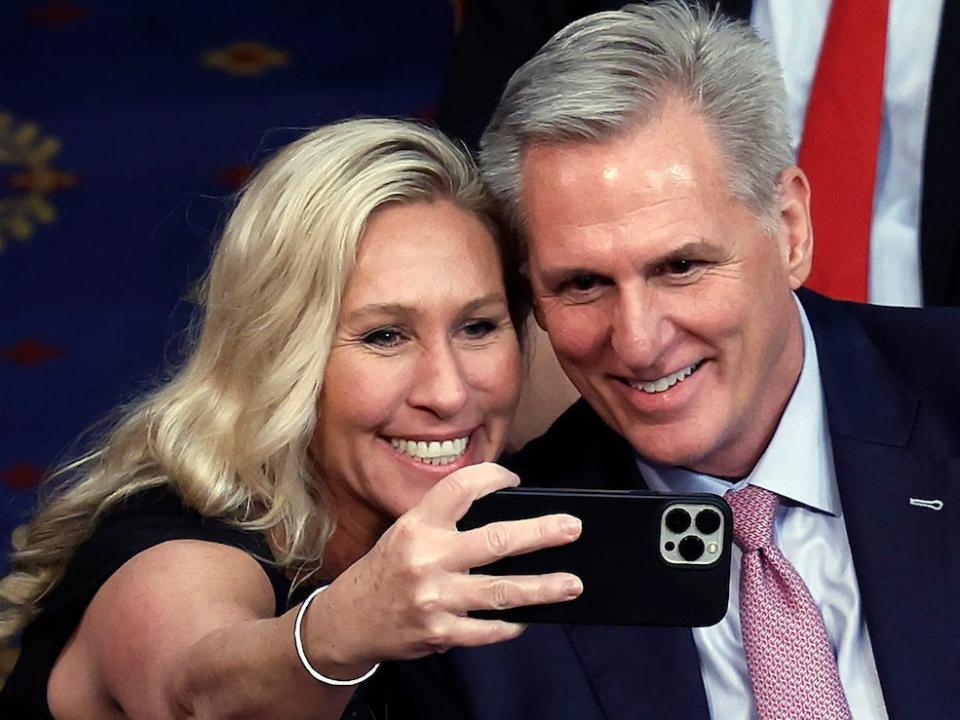 Republican Rep. Marjorie Taylor Greene of Georgia takes a selfie with Kevin McCarthy after his election as speaker of the House.