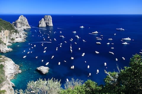 More than two million tourists visit Capri each year - Credit: getty