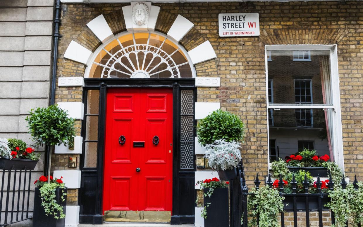 Harley Street doctor's surgery red door