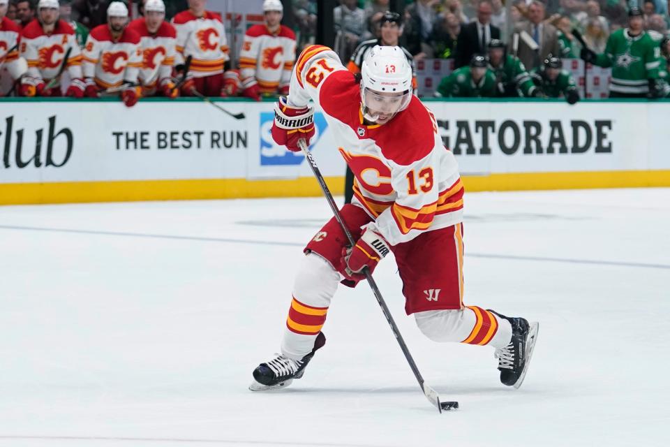 Calgary Flames left wing Johnny Gaudreau (13) in the second period of Game 4 of an NHL hockey Stanley Cup first-round playoff series against the Dallas Stars, Monday, May 9, 2022, in Dallas. (AP Photo/Tony Gutierrez)