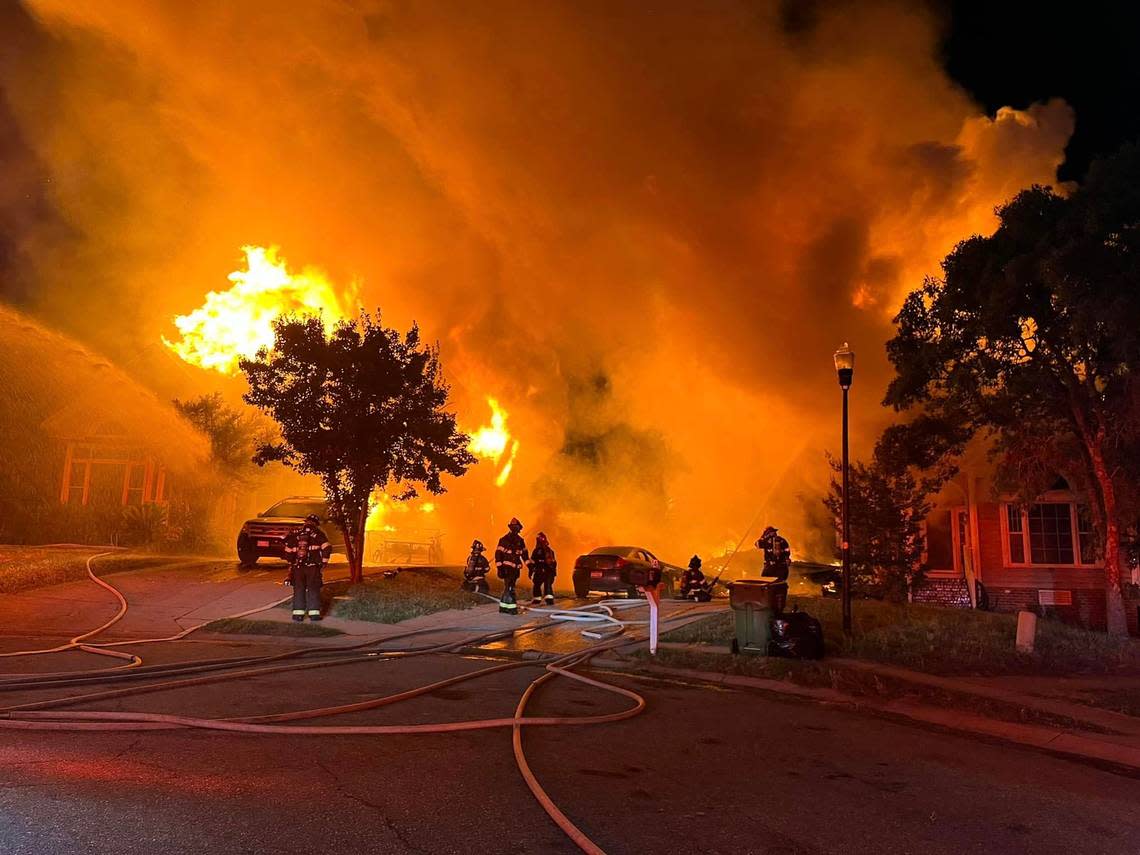 Members of the Columbia Fire Department battle a 2-Alarm fire.