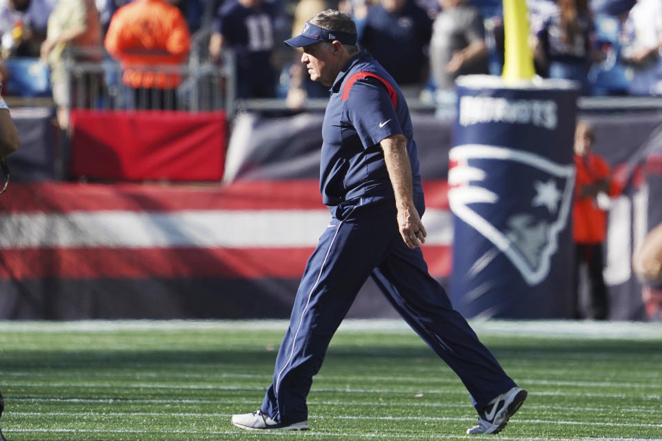 New England Patriots head coach Bill Belichick walks across the field after a loss to the New Orleans Saints in an NFL football game, Sunday, Sept. 26, 2021, in Foxborough, Mass. (AP Photo/Mary Schwalm)