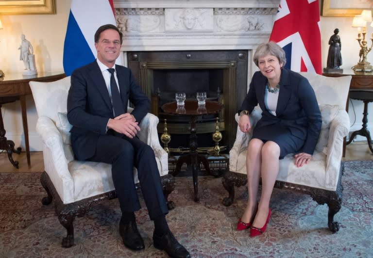 Britain's Prime Minister Theresa May (R) and Prime Minister of the Netherlands, Mark Rutte meet at No 10 Downing street as Britain challenged the EU's proposals to end a post-Brexit transition period on December 31, 2020