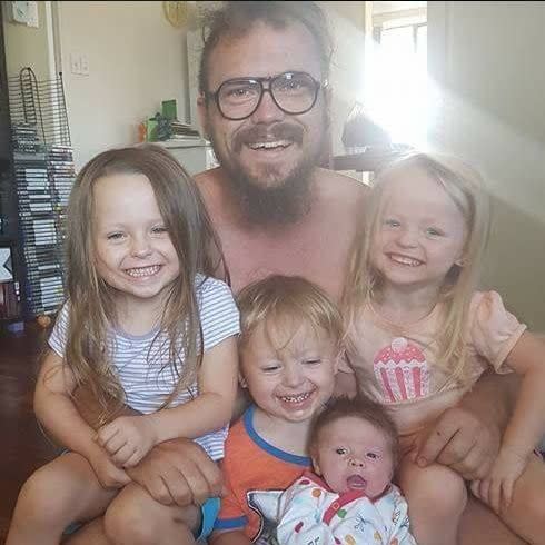 Photo of the children with their father James McLeod. 