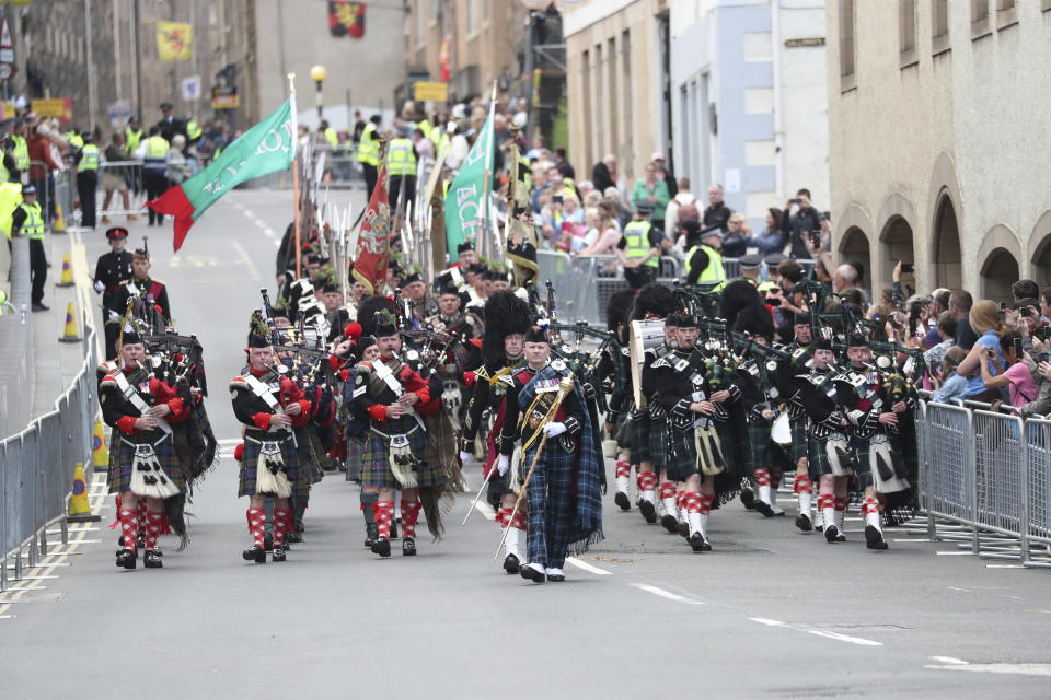 Pipers take part in the procession ahead of the National Service of Thanksgiving and Dedication for King Charles III and Queen Camilla, and the presentation of the Honours of Scotland, in Edinburgh, Scotland, Wednesday, July 5, 2023. Two months after the lavish coronation of King Charles III at Westminster Abbey in London, Scotland is set to host its own event to mark the new monarch's accession to the throne.(AP Photo/Scott Heppell, Pool)