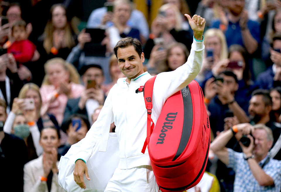 Roger Federer (pictured) waves to the fans after winning his first round match at Wimbledon.