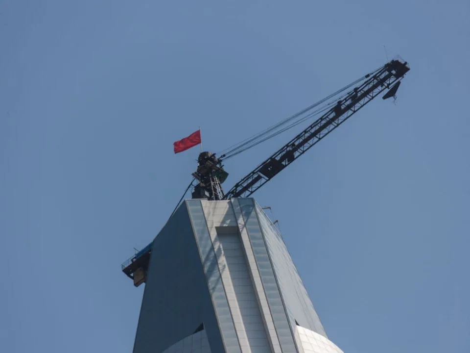 A crane on the roof of the Ryugyong Hotel.