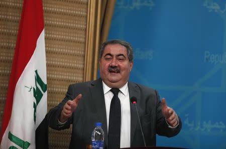 FILE PHOTO - Hoshyar Zebari gestures as he speaks during a farewell ceremony, ending his tenure as Foreign Minister, in Baghdad September 11, 2014. REUTERS/Ahmed Saad