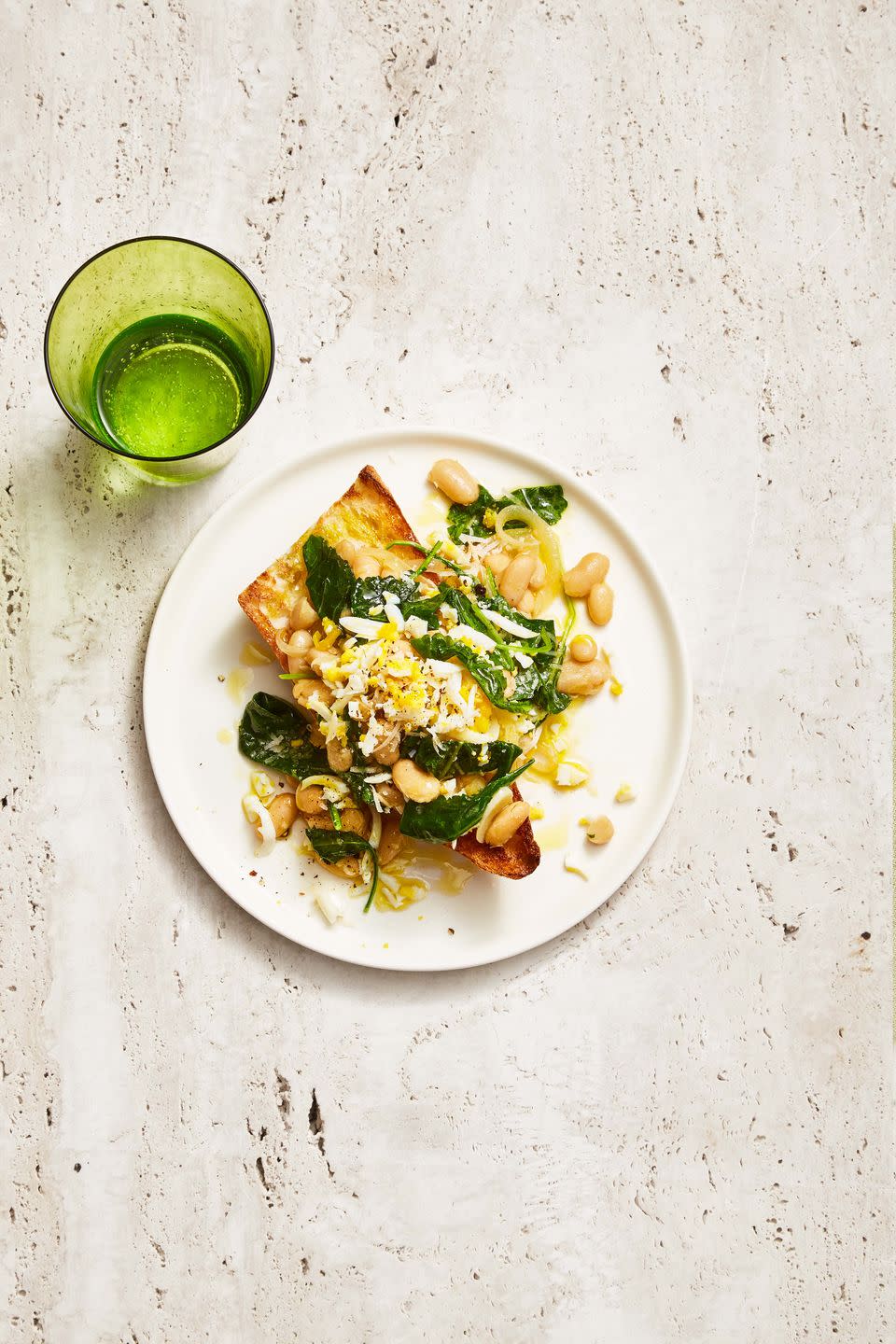 <p>Not just for breakfast, toast is a totally acceptable dinner when topped with creamy beans and tender kale.</p><p>Get the <strong><a href="https://www.goodhousekeeping.com/food-recipes/a38685594/white-bean-and-kale-toasts-recipe/" rel="nofollow noopener" target="_blank" data-ylk="slk:White Bean and Kale Toasts recipe" class="link ">White Bean and Kale Toasts recipe</a></strong>. </p>