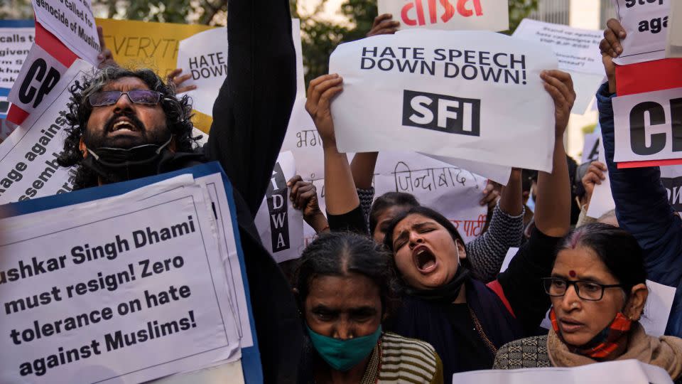 Protesters gather to demand action against hate speech in New Delhi, December 2021. - Manish Swarup/AP