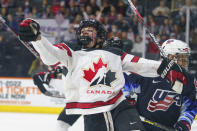 Canada's Sarah Fillier celebrates her goal against the United States during the first period of a hockey game Friday, Oct. 22, 2021, in Allentown, Pa. (AP Photo/Chris Szagola)